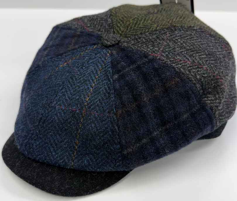 Woven cap with blue and gray pattern on a white background