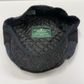 Gray tweed cap with quilted interior and Mucros Weavers label on a white background