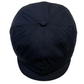 A dark navy blue newsboy cap with a structured six-panel crown and a curved brim, photographed from a top-down angle on a light off-white background.