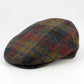 A classic flat cap in a multicolor plaid pattern featuring red, blue, yellow, and brown tones, photographed on a seamless white background.