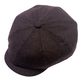 A dark plum purple woolly newsboy cap with a curved brim, photographed from a high angle on a light gray background.