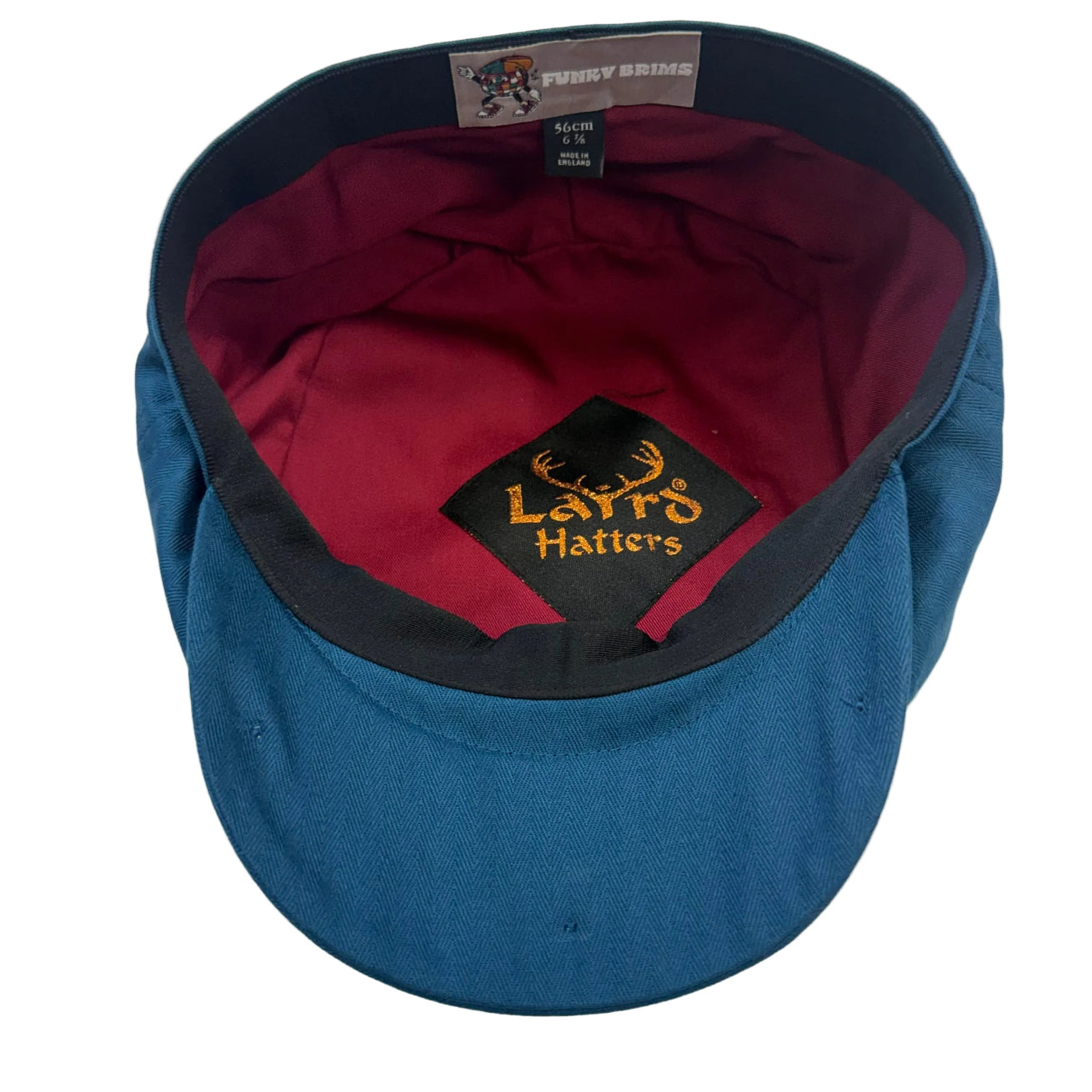 A hot teal wool newsboy cap with a dark red interior lining and black trim, featuring the embroidered 'Laird Hats' logo on the front and FunkyBrims logo. 
