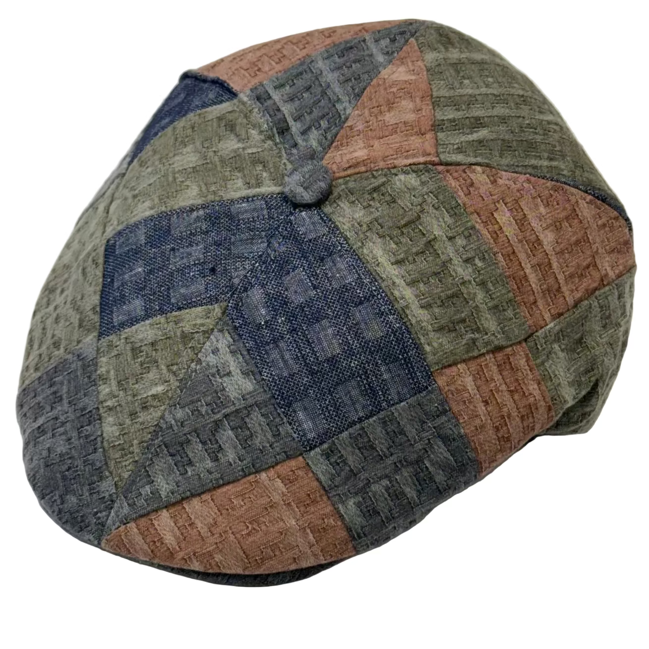 Patchwork-patterned beret on a white background