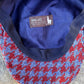 Inside The Troubadour newsboy cap, showing navy lining and the Ferla Baby Alpaca fabric label.