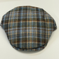 Plaid patterned cap on a white background
