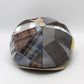 Patchwork cap with geometric pattern on a white background