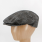 The Duke – Charcoal Plaid Flat Cap by Hologramme Paris – on mannequin