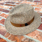 Three-quarter product view of the Masterpiece da Vinci Fedora by FunkyBrims, showing its shaped crown and ribbon band.