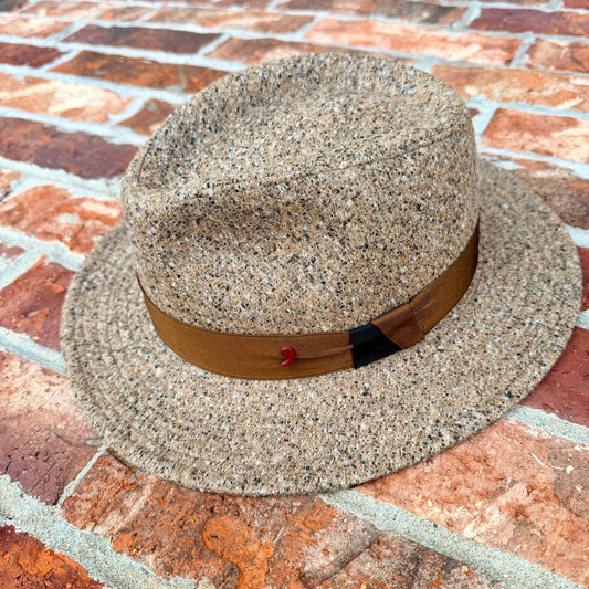 Three-quarter product view of the Masterpiece da Vinci Fedora by FunkyBrims, showing its shaped crown and ribbon band.