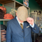 Crown view of the da Vinci Flat Cap by FunkyBrims as the model tips the short brim.