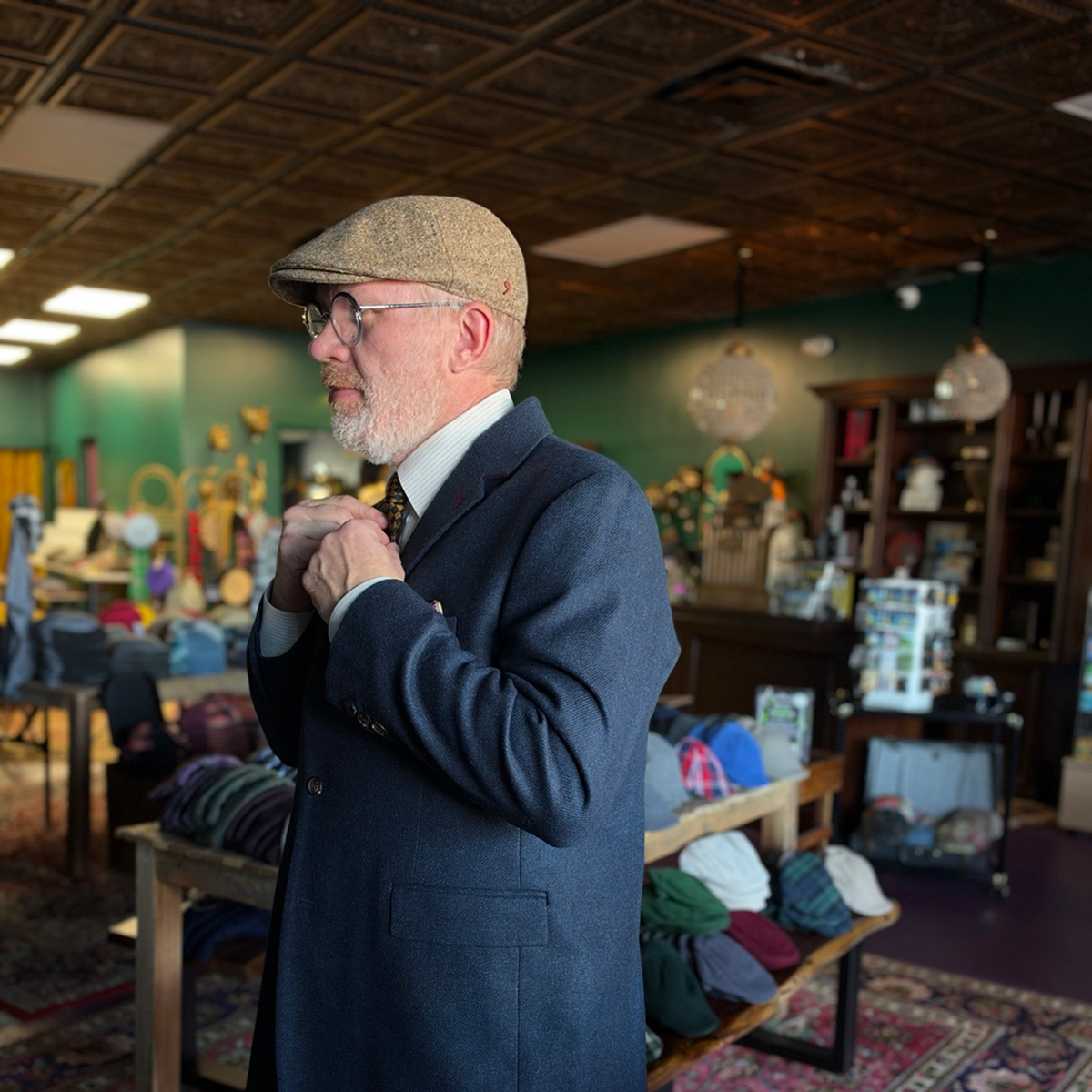 Side profile of the da Vinci Flat Cap by FunkyBrims, showing its gently sloping crown and short brim.