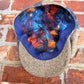 Interior view of the Masterpiece da Vinci Newsboy Cap by FunkyBrims, showing the colorful illustrated lining.