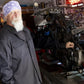 Black Blue Collar long sleeve shirt worn beside a motorcycle