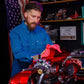 Hales Deep Teal Blue Collar long sleeve shirt worn while polishing a motorcycle