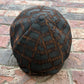 RazorClaw black and orange newsboy cap, front view