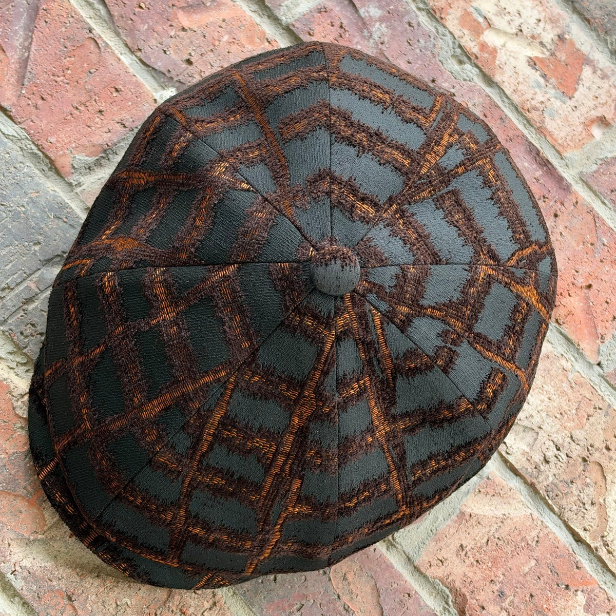 RazorClaw newsboy eight-panel crown and fabric-covered button