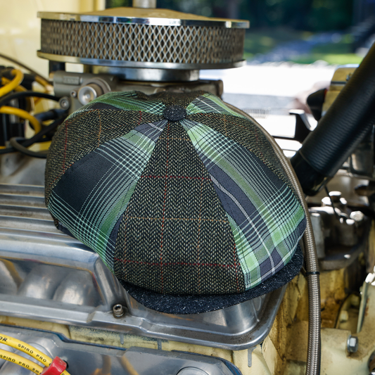 Wretch patchwork newsboy with alternating green plaid and windowpane tweed panels