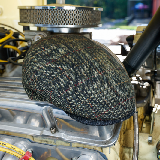 Wretch tweed flat cap with fine rust and burgundy windowpane lines
